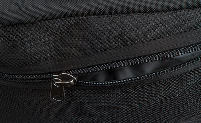 visible detail^^An close shot of the zipper on the mesh side compartment of the Road Buddy Duffel 60.