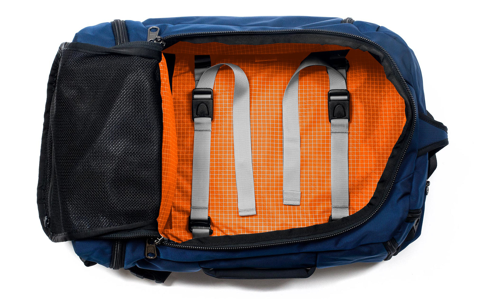 visible variant TB0902-DKZD^^ A Techonaut 30 with a Deep Blue (dark blue) exterior with Zest (orange with white grid pattern) 200 Halcyon interior.