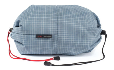 visible variant TB09376-7D^^An Aeronaut 45 Travel Laundry Stuff Sack in Tidal (pale blue with white grid) 200 Halcyon.