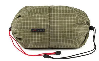 visible variant TB09376-8D^^An Aeronaut 45 Travel Laundry Stuff Sack in Taiga (olive green with white grid) 200 Halcyon.
