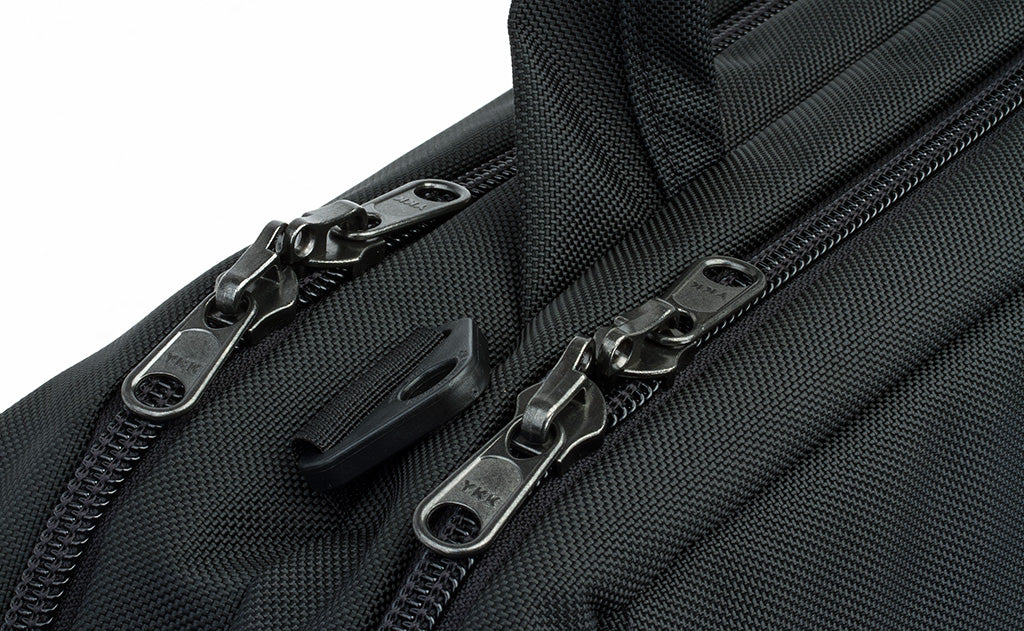 detail visible^^A close shot of the locking zippers on both of the main compartments.