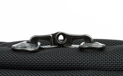 detail visible^^The locking zippers on a Black 525 Ballistic Western Flyer zipped shut to show the individual openings on each of the two zippers pairing together to create a slot for a travel lock.