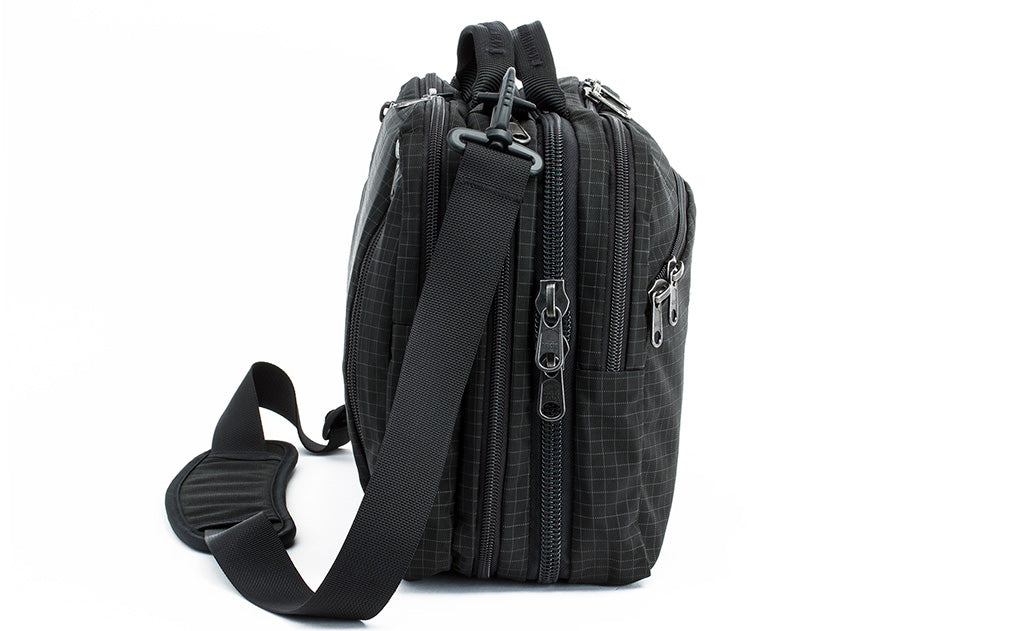 visible variant TB0975-BHND^^A side-on shot of The Stowaway in Black (black with grey grid) 400 Halcyon.