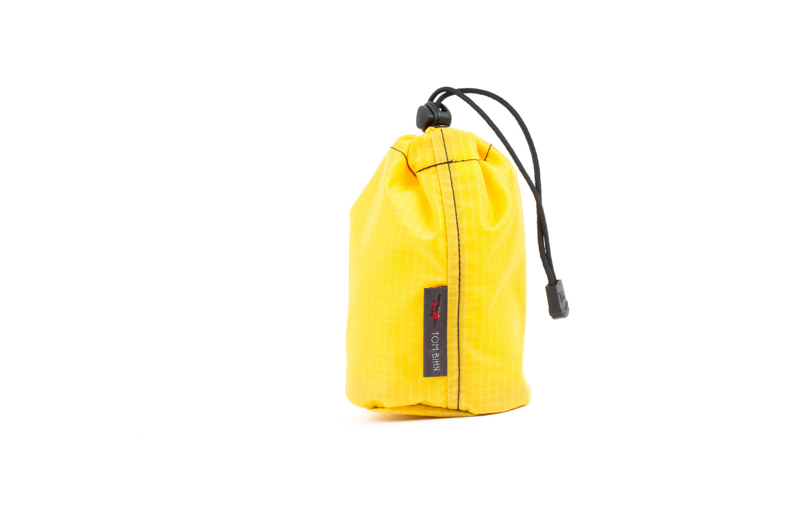 visible variant TB1251-RL^^A Size 1 Marigold (yellow with light yellow grid) 210 Cerylon Travel Stuff Sack.