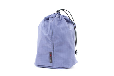 visible variant TB1254-DL^^A Size 4 Dusk (blue-grey with light blue-grey grid) 210 Cerylon Travel Stuff Sack.