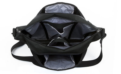 detail visible^^Parental Unit with all compartments open, showing the interior pockets.