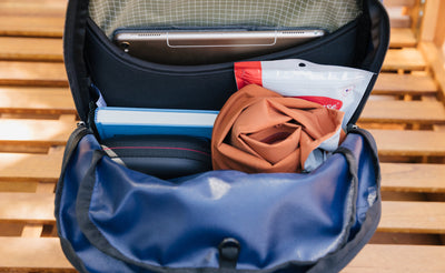 lifestyle visible^^A top-down photo looking down into the main pocket of a Deep Blue Paramour with Taiga Halcyon interior. 