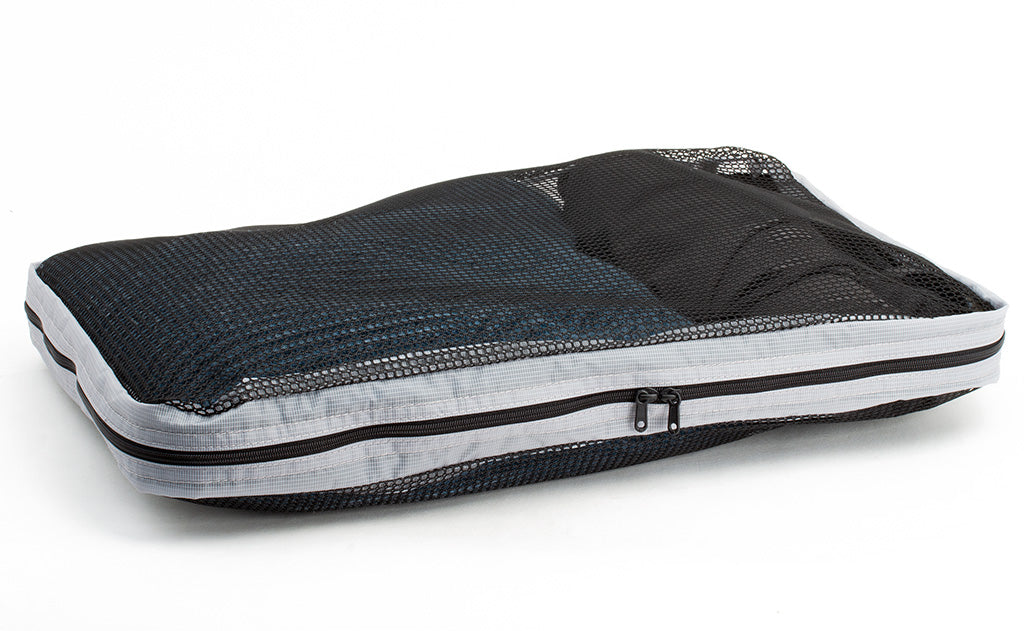 visible variant TB94004-NE^^A full, closed Large Tri-Star Packing Cube in Northwest Sky (light grey) 120 Aether.