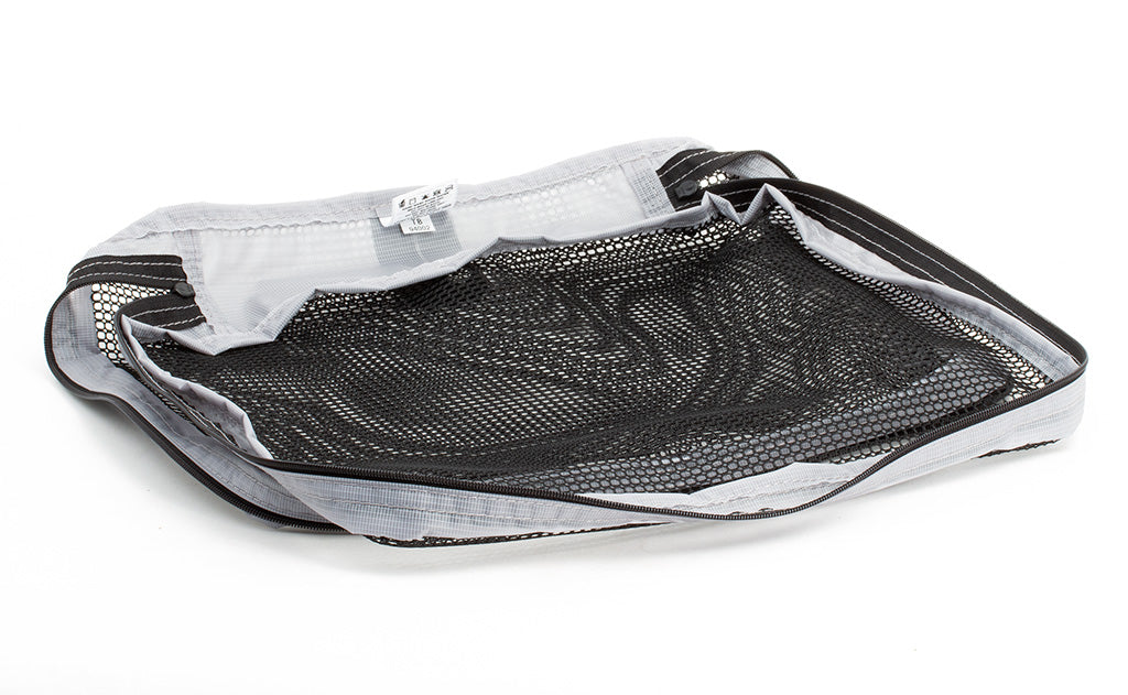 visible variant TB94002-NE^^An empty, open Medium Tri-Star Packing Cube in Northwest Sky (light grey) 120 Aether.