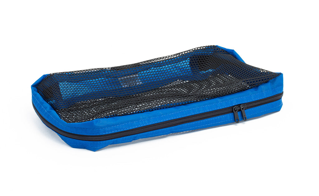 visible variant TB94000-LE^^An empty, closed Small Tri-Star Packing Cube in Island (blue) 120 Aether.