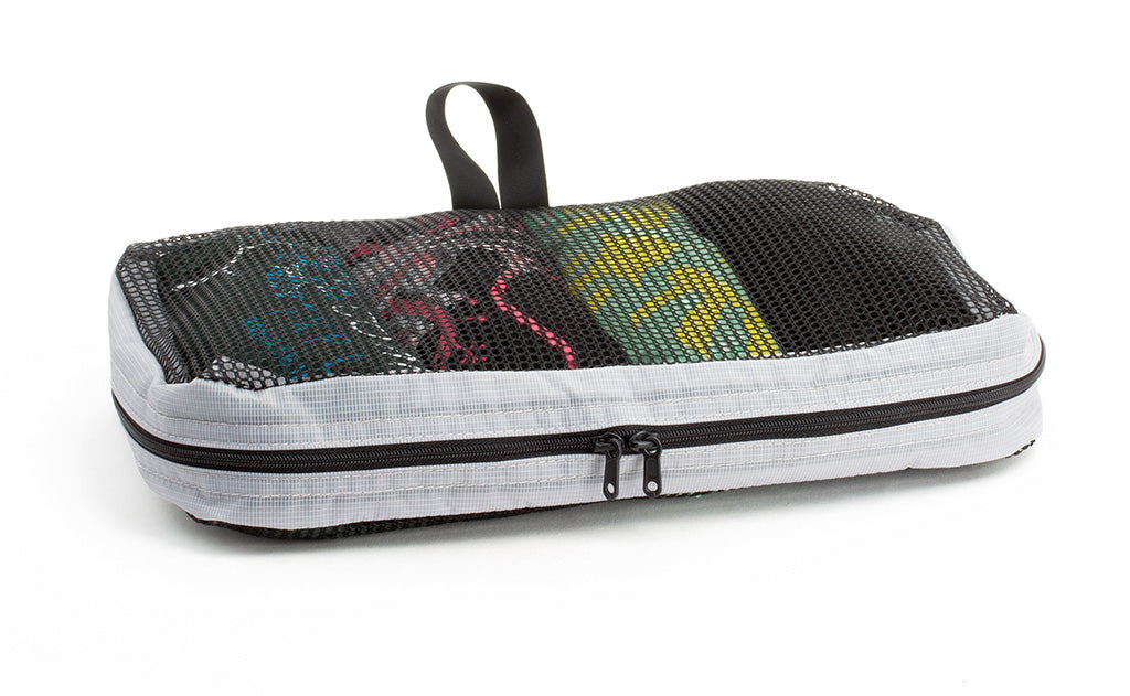 visible variant TB94000-NE^^A full, closed Small Tri-Star Packing Cube in Northwest Sky (light grey) 120 Aether.