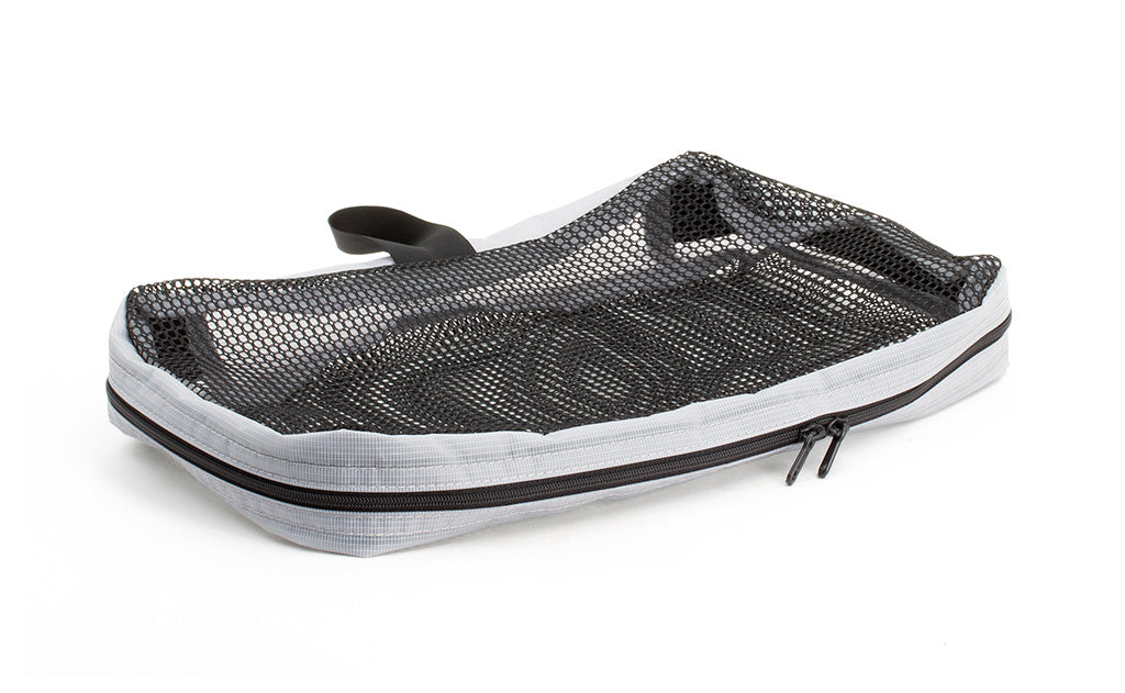 visible variant TB94000-NE^^An empty, closed Small Tri-Star Packing Cube in Northwest Sky (light grey) 120 Aether.