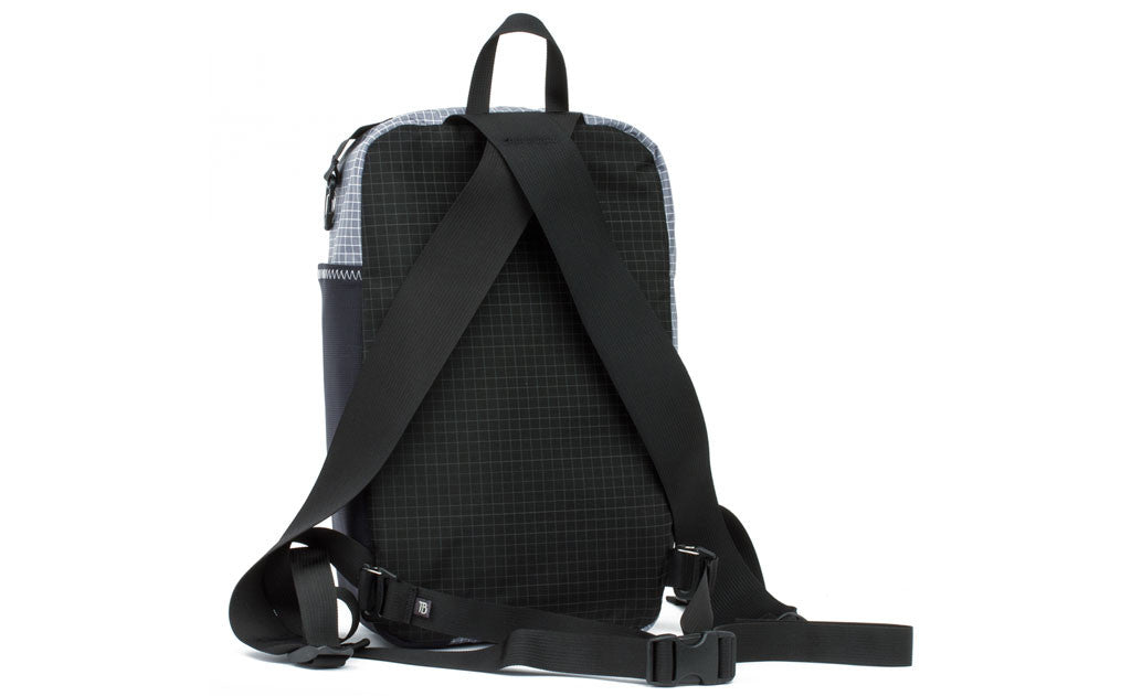 visible variant TB0907-BHND TB0907-DHND^^A reverse shot of the top pocket of the Hero's Journey inverted into a backpack.