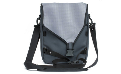 visible variant TB0243-SBND^^The Ristretto in Steel (medium grey) 1050 Ballistic with Northwest Sky (light grey with white grid) 200 Halcyon interior.