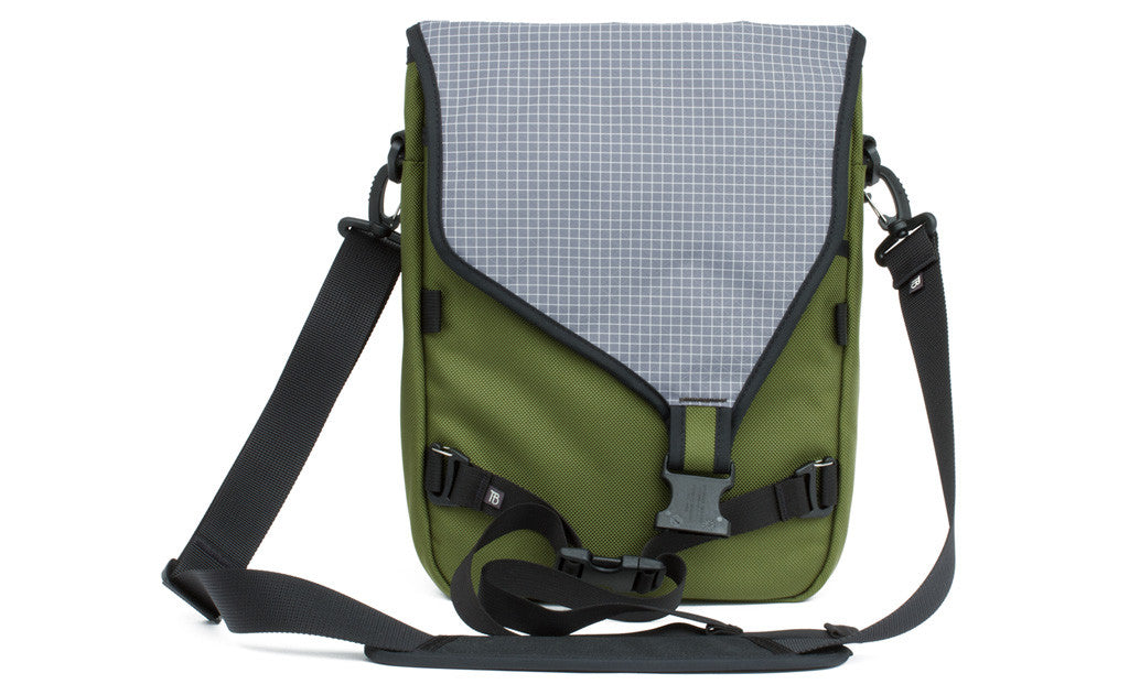 visible variant TB0243-VBND^^The Ristretto in Verde (green) 1050 Ballistic with Northwest Sky (light grey with white grid) 200 Halcyon interior.
