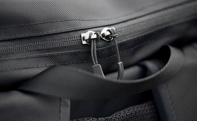 detail visible^^Close-up of the top pocket zipper on the Shadow Guide; we've cut the metal pulls off and have replaced them with cord pulls so you don't have to.