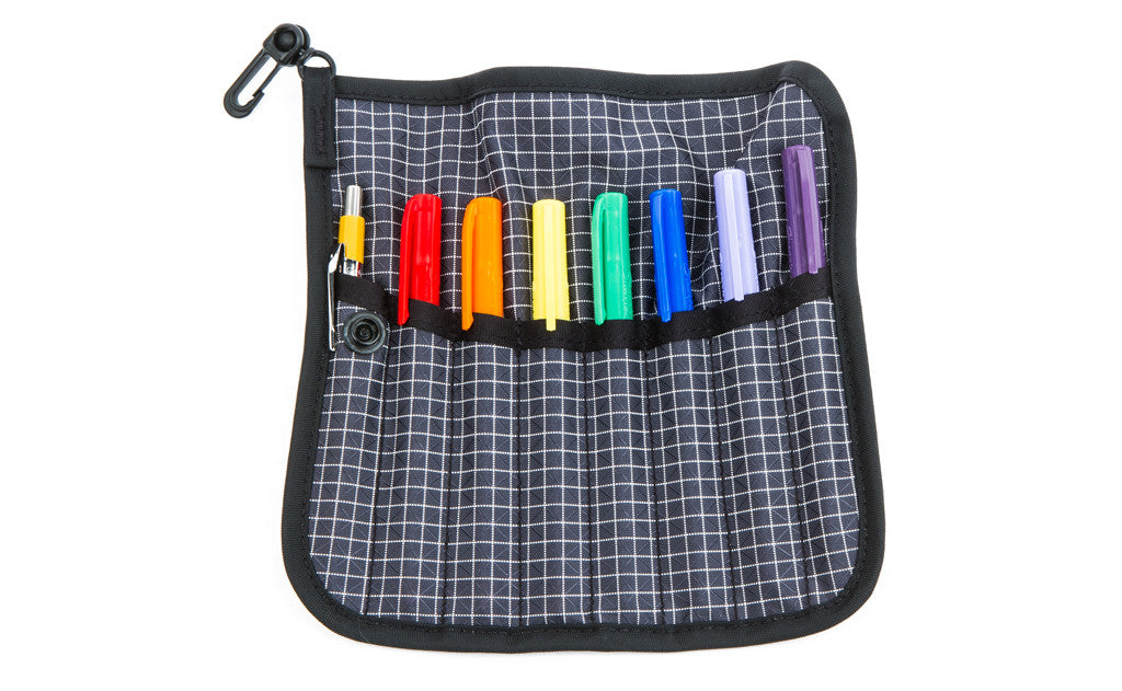 detail visible^^A Tool Pen Wrap filled with fine-tipped Sharpies.