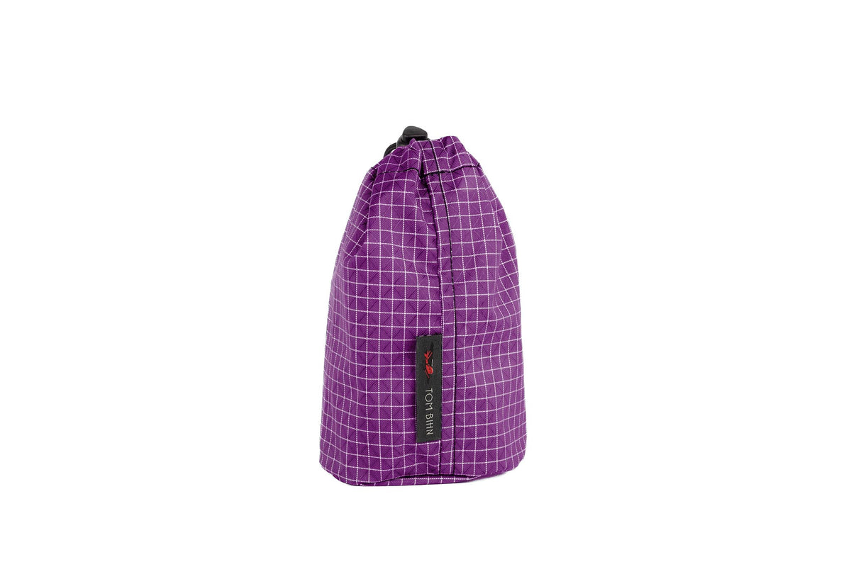 visible variant TB1251-UD^^A Size 1 Ultraviolet (purple with white grid) 200 Halcyon Travel Stuff Sack.
