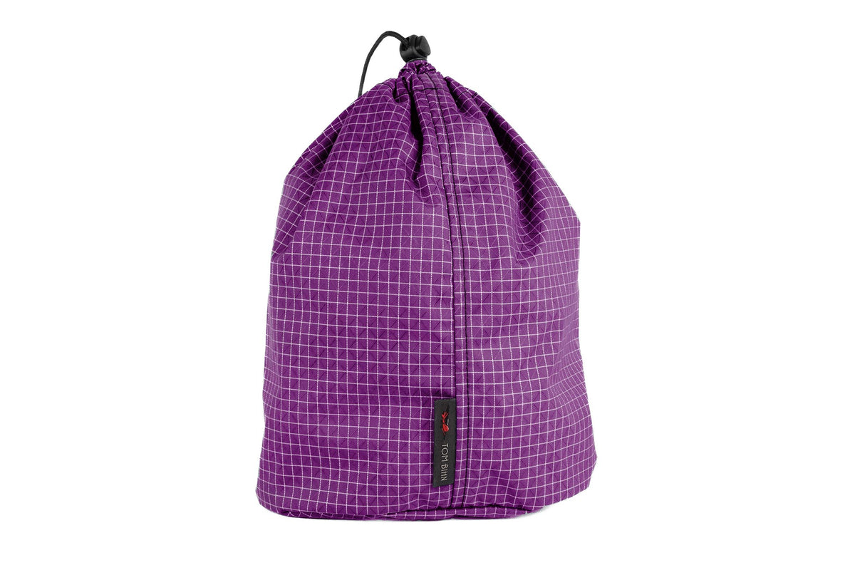 visible variant TB1254-UD^^A Size 4 Ultraviolet (purple with white grid) 200 Halcyon Travel Stuff Sack.