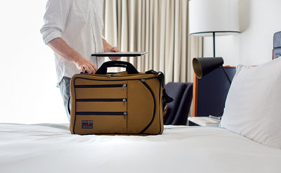 lifestyle visible^^A Tri-Star in Coyote (brown) 525 Ballistic in a hotel room.