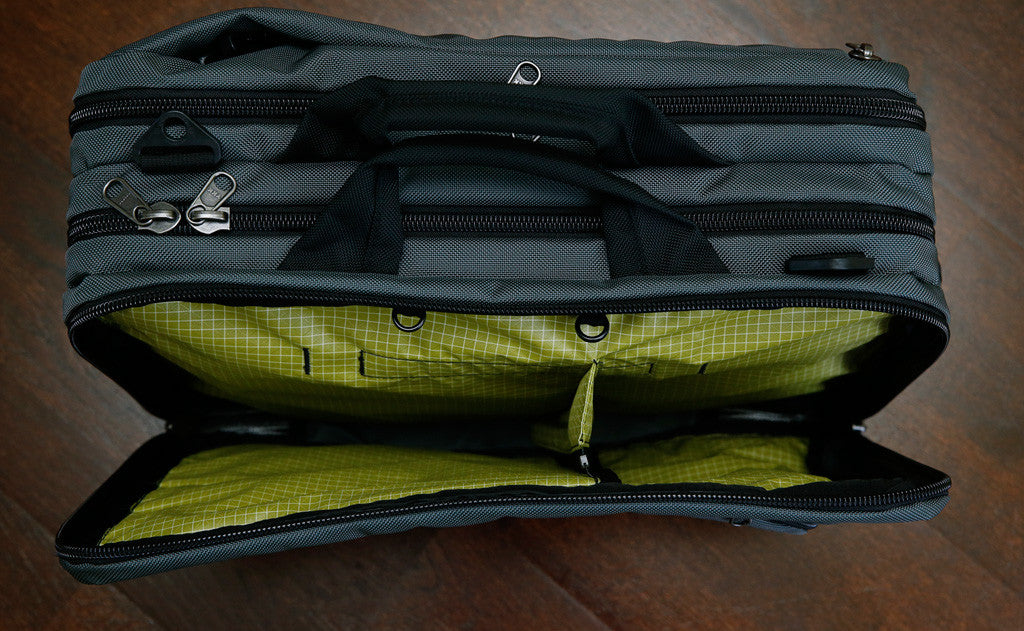 detail visible^^A top-down shot of the front main pocket's zippered divider while zipped.