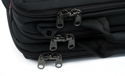 detail visible^^A close shot of the three main pockets and their locking zippers.