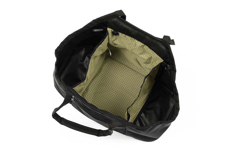 visible variant TB0619-BK8D^^The Truckasana in Black/Taiga. Top-down view shows the three main compartments of the bag empty.