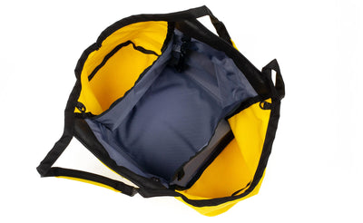 visible variant TB0619-YCDJ^^The Truckasana in Canary yellow with Dawn lining. Top-down photo shows the empty three main compartments of the bag.
