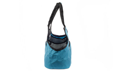 visible variant TB0619-LRLJ^^The Truckasana in Logic Blue and Cloud grey lining. Side view of the bag.