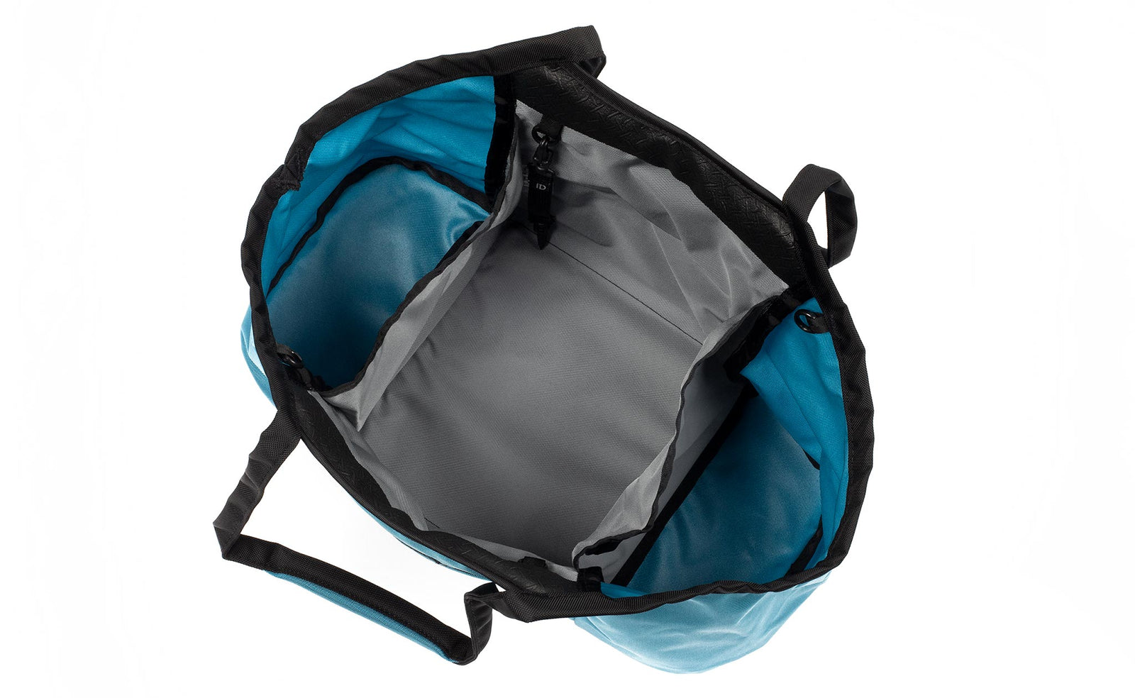 visible variant TB0619-LRLJ^^The Truckasana in Logic Blue with Cloud grey lining. Top-down photo shows the empty three main compartments of the bag.