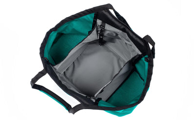 visible variant TB0619-MCLJ^^The Truckasana in Mayura 1000d Cordura with Cloud grey lining. Top-down photo shows the empty three main compartments of the bag.