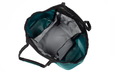 visible variant TB0619-SRLJ^^The Truckasana in Seapine green with Cloud grey lining. Top-down photo shows the empty three main compartments of the bag.
