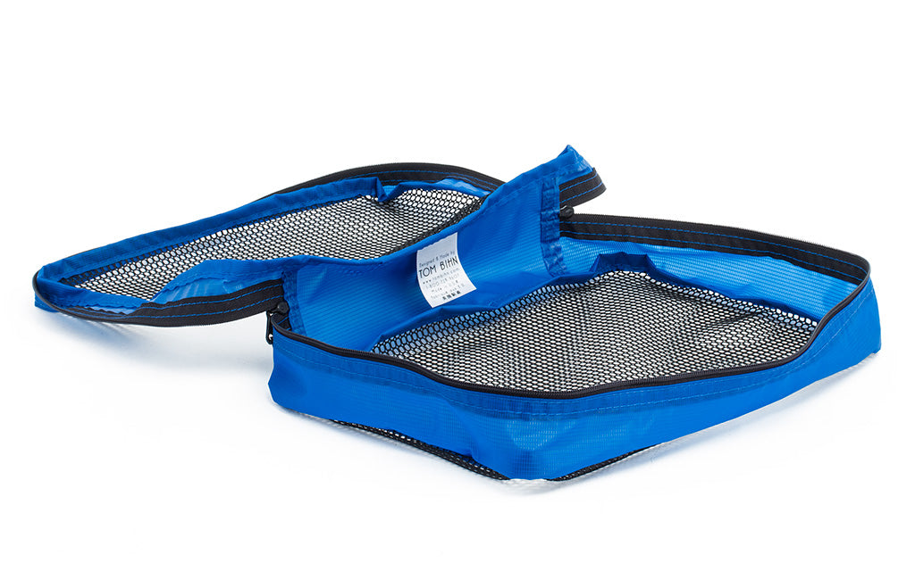 visible variant TB95200-LE^^An empty, open Small Western Flyer Packing Cube in Island (blue) 120 Aether.