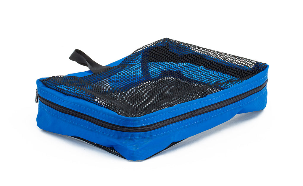 visible variant TB95200-LE^^An empty, closed Small Western Flyer Packing Cube in Island (blue) 120 Aether.