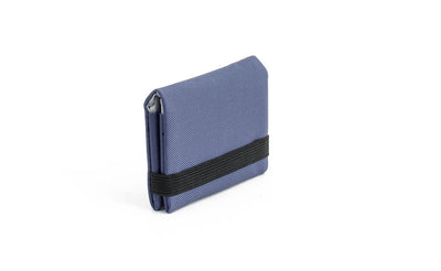 visible variant TB1277-DJ^^The Size 1 Nik's Minimalist Wallet in Dawn (blue-grey) 210 Ballistic closed with the attached elastic band.