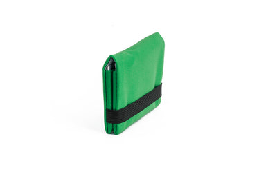 visible variant TB1277-GJ^^The Size 1 Nik's Minimalist Wallet in Grass (bright green) 210 Ballistic closed with the attached elastic band.