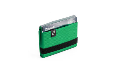 visible variant TB1277-GJ^^The Size 1 Nik's Minimalist Wallet in Grass (bright green) 210 Ballistic closed pockets-out with the attached elastic band.