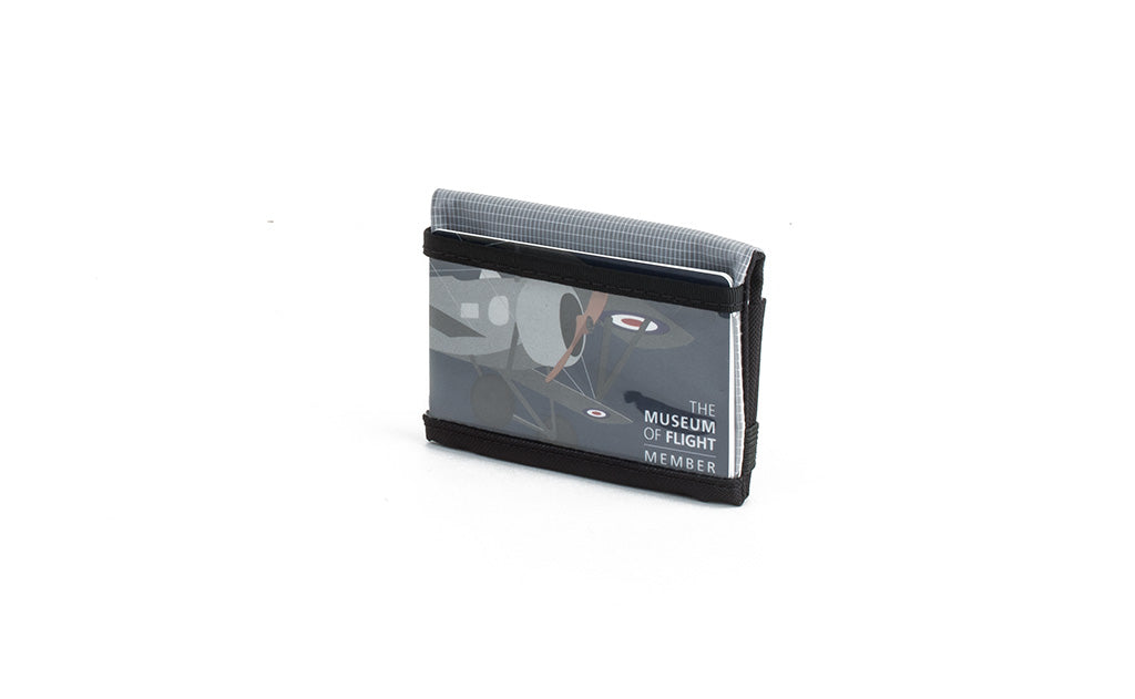 visible variant TB1279-BJ^^The Size 3 Nik's Minimalist Wallet in Black 210 Ballistic closed interior pockets-out with the attached elastic band.