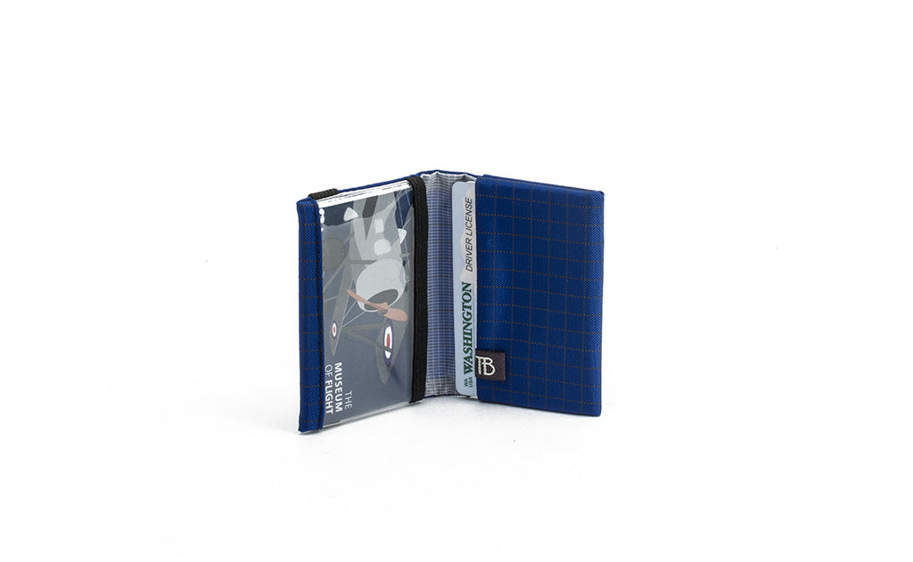 visible variant TB1279-DH^^The Size 3 Nik's Minimalist Wallet in Nordic (blue with grey grid) 400 Halcyon.