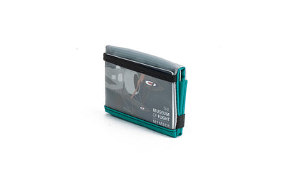 visible variant TB1279-VJ^^The Size 3 Nik's Minimalist Wallet in Viridian (blue-green) 210 Ballistic closed interior pockets-out with the attached elastic band.