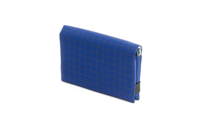 visible variant TB1275-DH^^The Size 5 Nik's Minimalist Wallet in Nordic (blue with grey grid) 400 Halcyon closed with the attached elastic band.