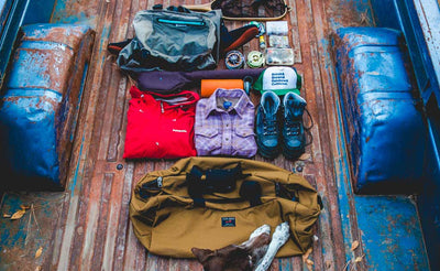 lifestyle visible ^^ A potential fishing load out for the Yeoman Duffel, including an extra change of clothes, boots, water bottle, fishing tackle and line, and a net.