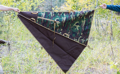 visible^^ Two people holding the unfurled Beaver Transfer Bag