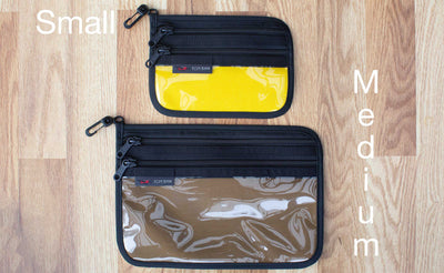 lifestyle visible^^Small Double Organizer Pouch in Canary and Medium Double Organize Pouch in Coyote.