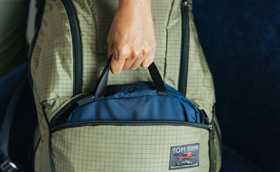 detail visible^^Navy Parapack Grab Bag being pulled out of the bottom pocket of a Synik 30.