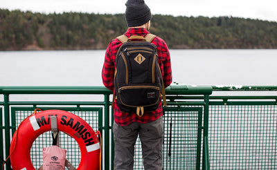 lifestyle visible^^A person on a ferry wearing the Guide's Edition Synapse 25.