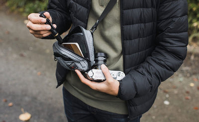 visible lifestyle ^^ A person retrieving a pen and camera from the HLT1.