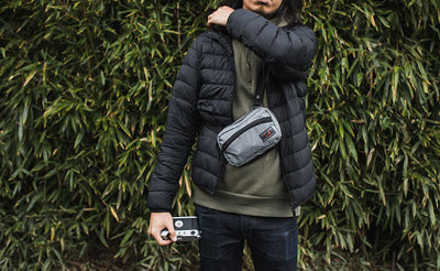 visible lifestyle ^^ A person wearing the HLT1 as a sling bag.