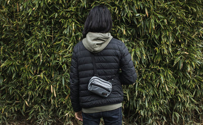 visible lifestyle ^^ The back of a person wearing the HLT1 as a sling pack.
