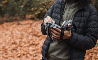 visible lifestyle ^^ A person using the handle and thumb webbing to hold the HLT1 open like a book.